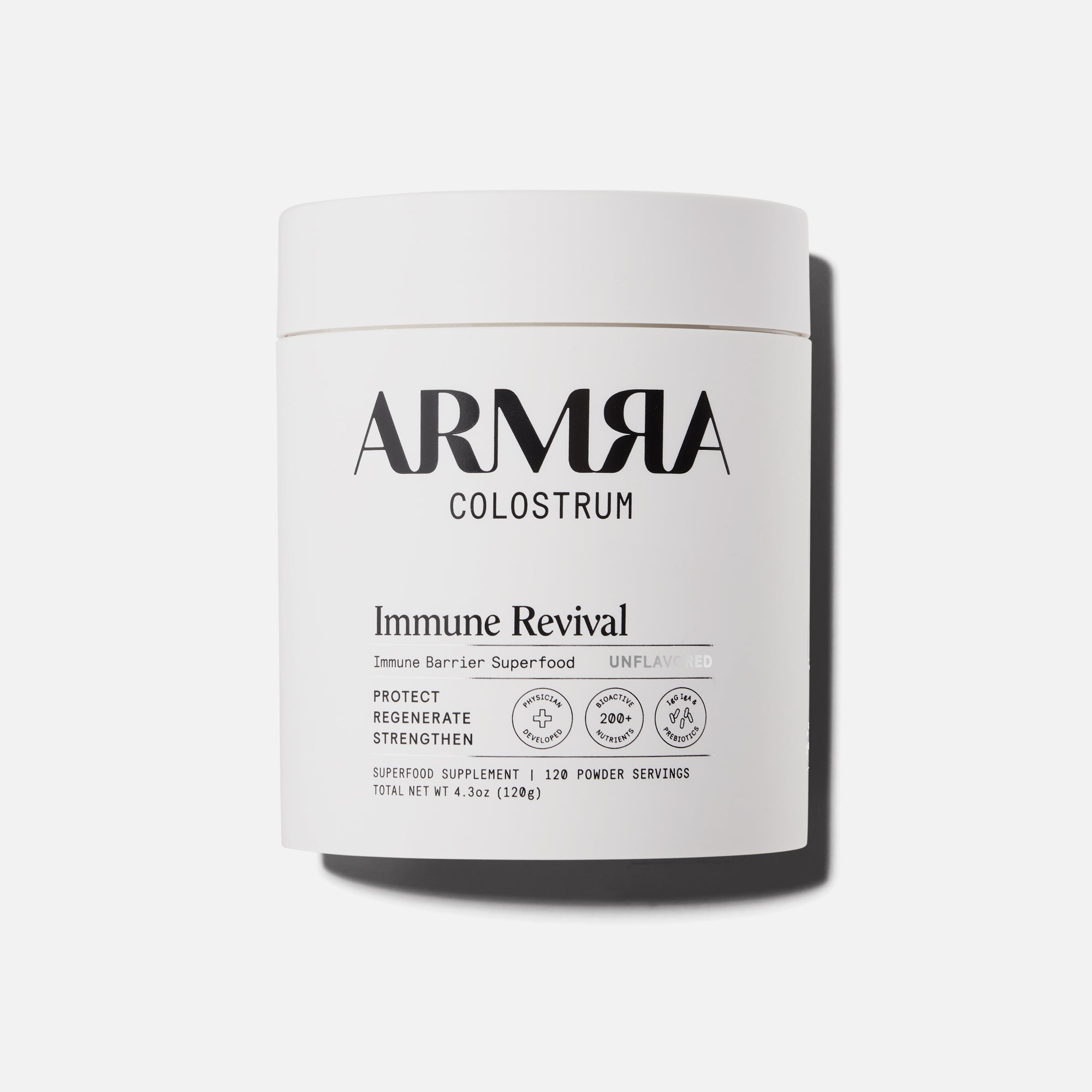 White Jar of ARMRA Colostrum Unflavored on a White Background
