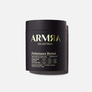 Black jar of ARMRA Colostrum™ Performance Revival on a white background