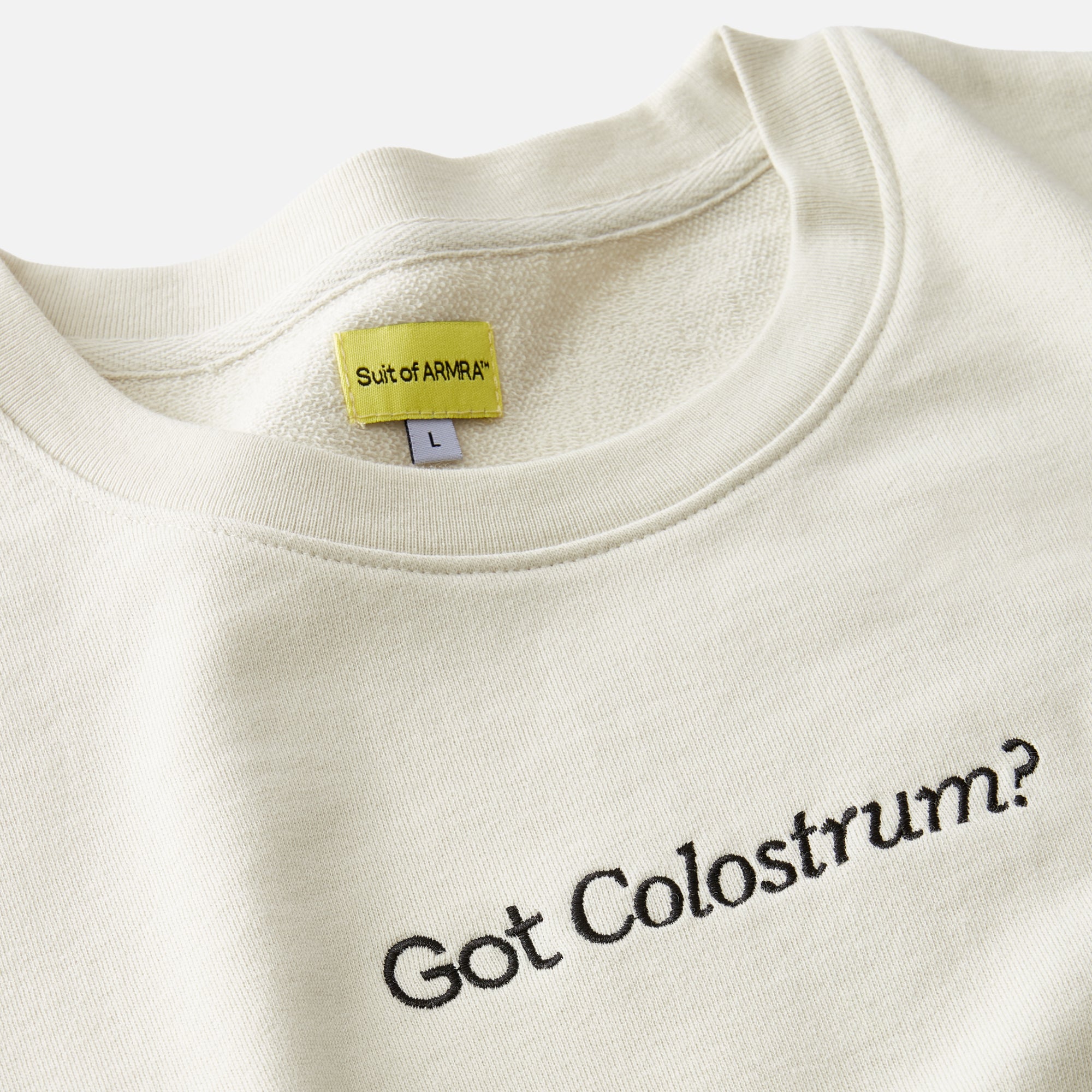 Cream Sweatshirt with "Got Colostrum?" embroidered text
