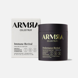 White box of ARMRA Colostrum Immune Revival and black jar of ARMRA Performance Revival on white background