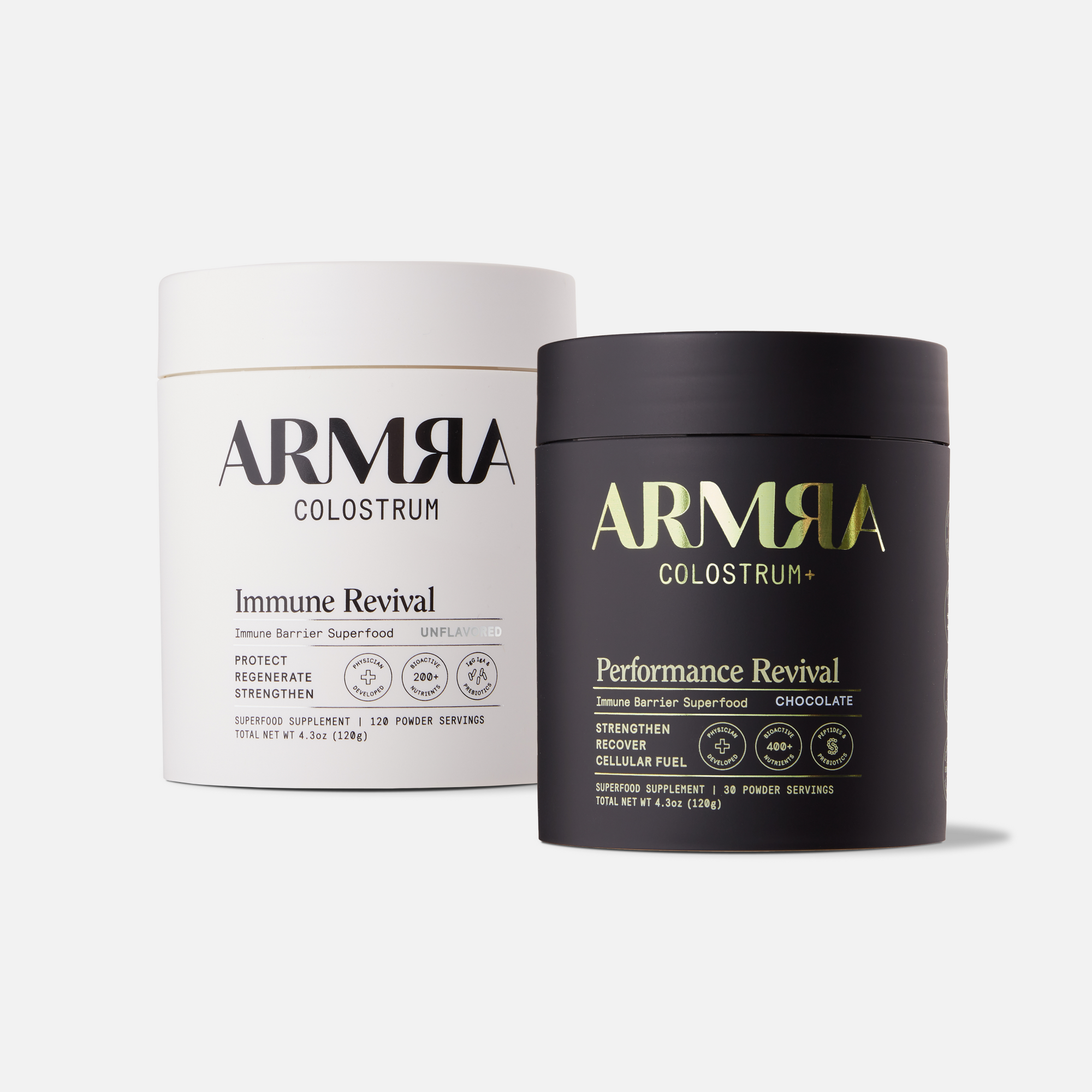 White Jar of ARMRA Colostrum Immune Revival and Black Jar of ARMRA Performance Revival on White Background