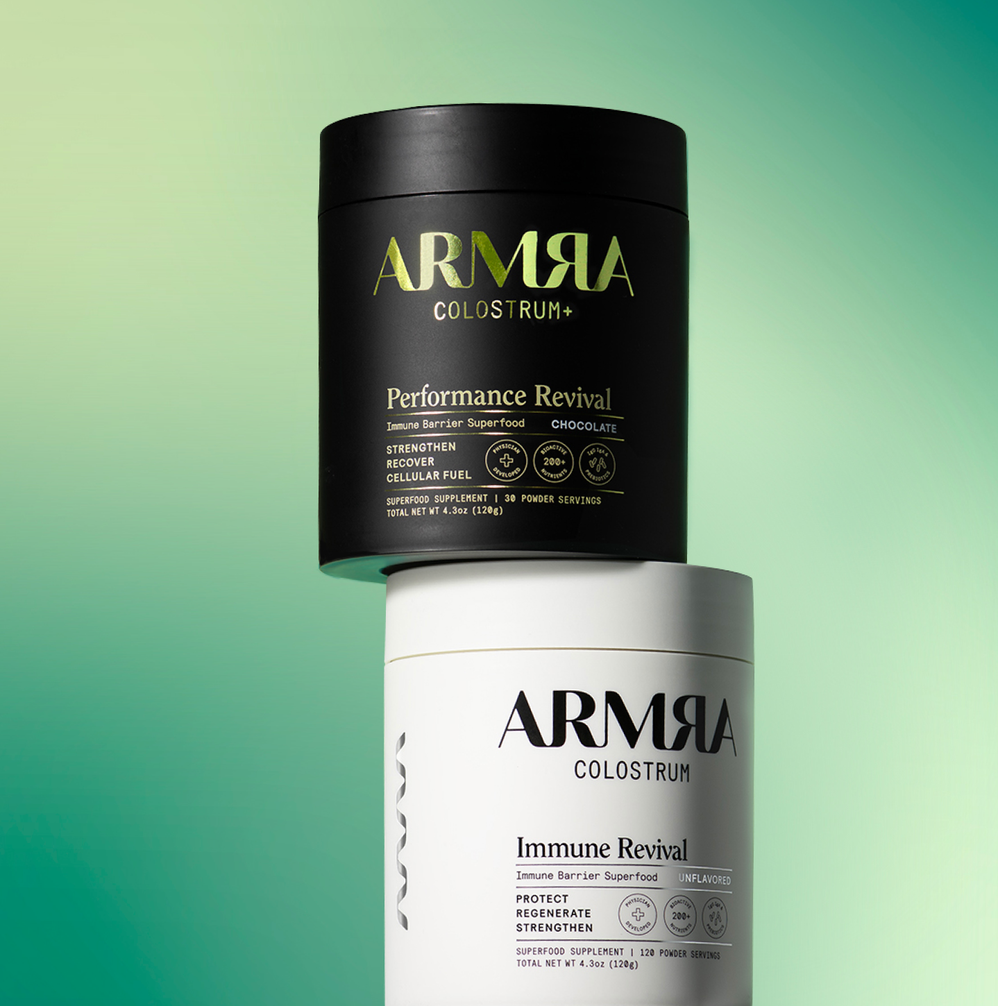 Black ARMRA Colostrum Performance Revival Jar stacked on top of White ARMRA Colostrum Immune Revival Jar 