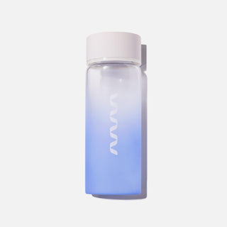 Cream Lid on a glass Water Bottle with blue gradient and Ribbon